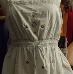 New,tag,light seaform embroidered front elastic waist&back straps cami size med.